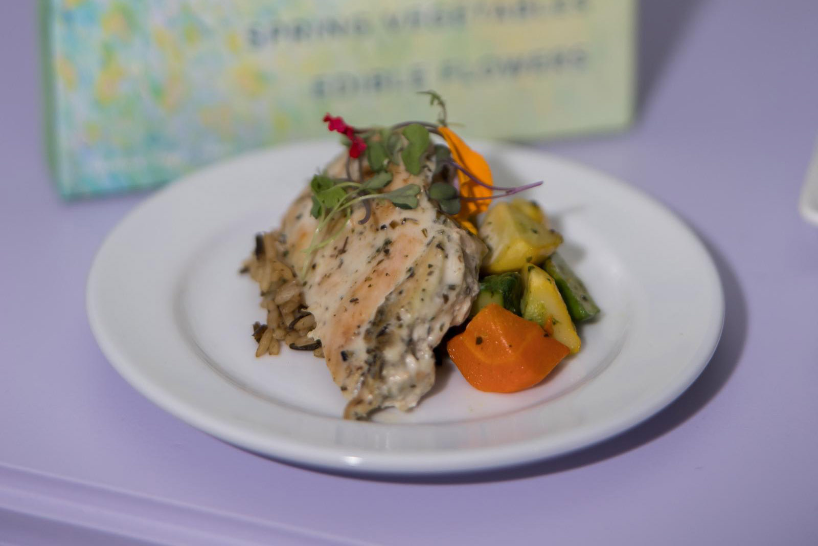 Roasted chicken small plate presentation at Arts District Mansion
