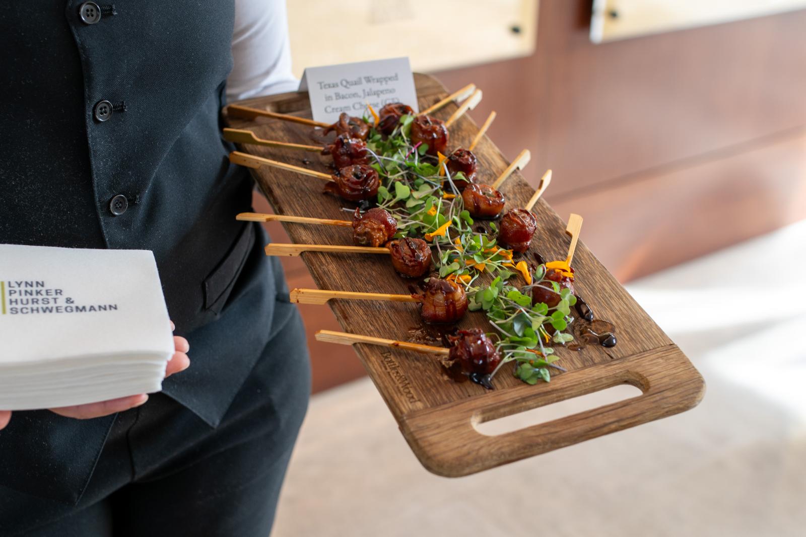 Texas quail wrapped in bacon appetizer presentation